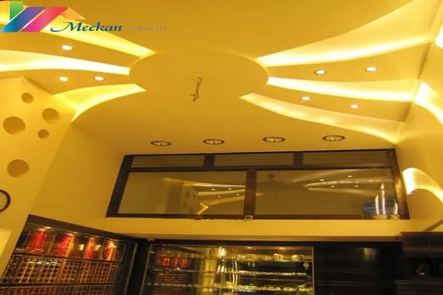 Jewellery showroom with illuminated ceiling panels and glass display counters.